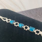 Blue and white jeweled bracelet *New*